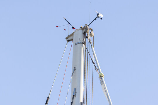 Sailboat mast rigging with anemometer and wind vane