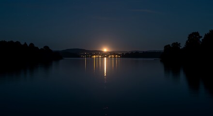 Obraz premium Nighttime Lake Reflection Moonlight