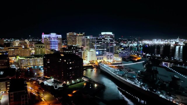Aerial drone view of downtown Norfolk skyline at night, Virginia