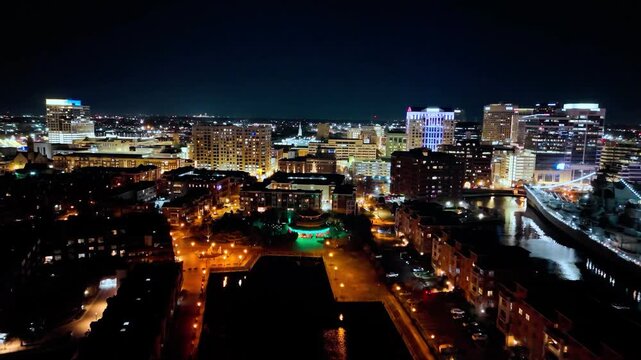 Aerial drone view of downtown Norfolk skyline at night, Virginia