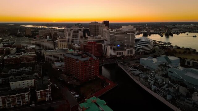 Aerial sunrise over downtown Norfolk skyline and Elizabeth River waterfront, Virginia