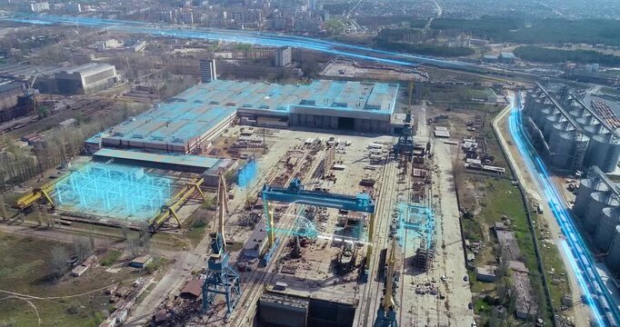 Aerial view of a shipyard or large metalworking plant. Smart factory or plant concept. Smart industry and Smart manufacturing plant outside. Industrial exterior. Aerial view
