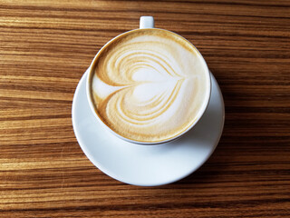 Top View of Cappuccino Coffee Cup on Wooden Table