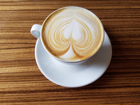 Top View of Cappuccino Coffee Cup on Wooden Table