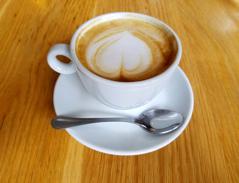 Cappuccino Coffee Cup Froth Art and Spoon