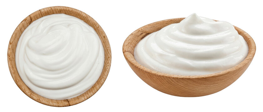 Creamy White Yogurt or Sour Cream in Wooden Bowls Isolated View