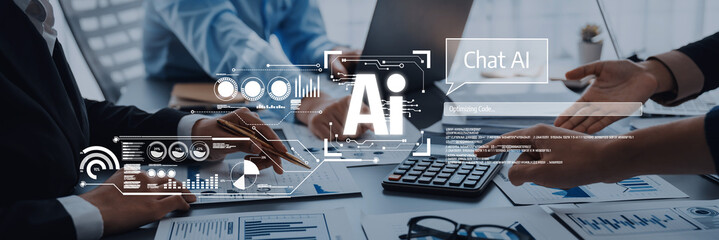 Professionals work together in a modern office to develop artificial intelligence solutions, showcasing data analytics and innovative concepts through collaboration. Trope