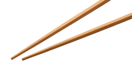 Elegant, slender light brown wood chopsticks with natural grain, polished, traditional design, diagonally against a transparent background with copy space, concept of traditional Asian dining elegance
