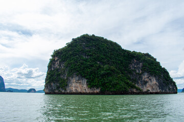 Aerial view from Big Buddha on Coast of Phuket Island in Thailand. Beautiful landscape Jungle and turquoise blue water of Andaman Sea 