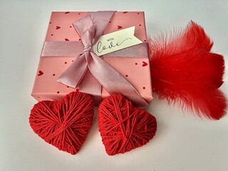 Red hearts Valentine&rsquo;s Day decoration on a light background. Romantic holiday concept symbolizing love, romance, and affection. Ideal for greeting cards, invitations, social media, advertising, brandi