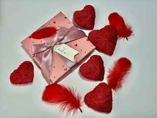 Red hearts Valentine&rsquo;s Day decoration on a light background. Romantic holiday concept symbolizing love, romance, and affection. Ideal for greeting cards, invitations, social media, advertising, brandi