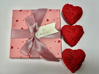 Red hearts Valentine&rsquo;s Day decoration on a light background. Romantic holiday concept symbolizing love, romance, and affection. Ideal for greeting cards, invitations, social media, advertising, brandi