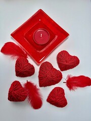 Red hearts Valentine&rsquo;s Day decoration on a light background. Romantic holiday concept symbolizing love, romance, and affection. Ideal for greeting cards, invitations, social media, advertising, brandi