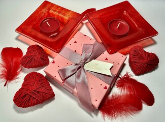 Red hearts Valentine&rsquo;s Day decoration on a light background. Romantic holiday concept symbolizing love, romance, and affection. Ideal for greeting cards, invitations, social media, advertising, brandi