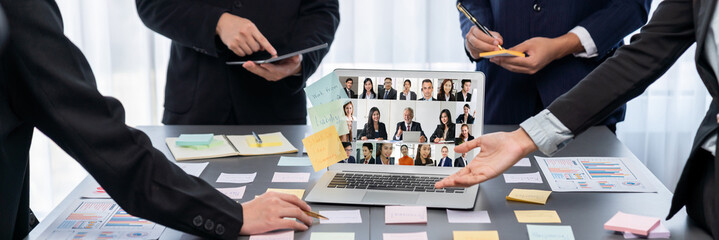 Analyst team use sticky note for creative and analytic brainstorm for business idea with BI data dashboard on laptop screen. Analysis financial data visualization tech for marketing strategy. Prodigy