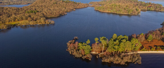 Naklejka premium Loch Lomond aerial view showing islands Inchtavannach, Inchconnachan, Inchcruin and Inchfad