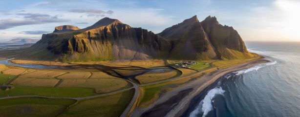 Stunning aerial view of rugged Icelandic mountains meeting the ocean