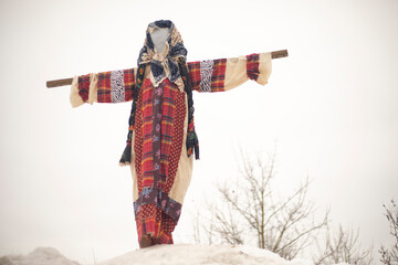 Maslenitsa in Russia. Scarecrow on the mountain. Farewell to spring. Burning a mannequin.