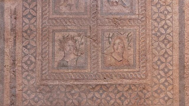 Ancient Roman Mosaic Floor with Human Figures - Detailed view of the ancient Roman mosaic floor from the archaeological site of the metropolis in western Turkey