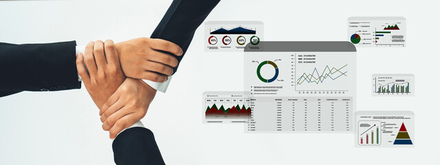 Hands joining together symbolize teamwork in business. Surrounding charts and graphs represent data analysis and strategic planning for financial growth and market research. Trope
