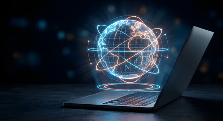 Global digital network connection and futuristic world data communication technology concept with glowing earth hologram appearing from laptop screen in dark background