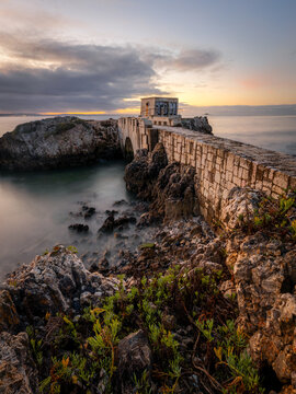 Tide gauge in Paco de Arcos, Portugal at sunrise