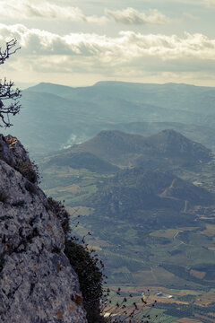 Vertical image of the countryside in Crete. A sunny day in the rural area of ​​Archanes from the top of mount Giouchtas.	