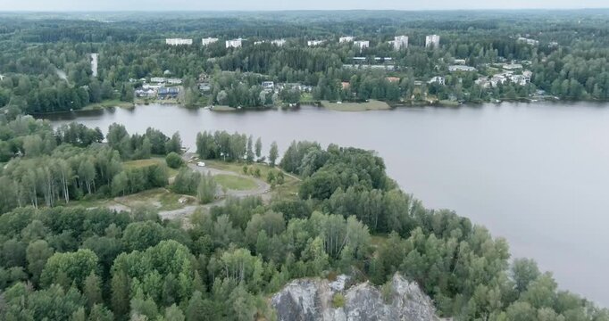 Aerial view of old T&ouml;rm&auml; open pit mine in cloudy summer weather, Lohja, Finland.