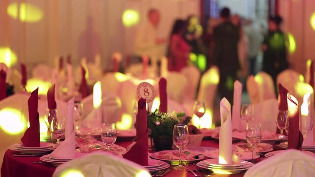 Crowd of People Gathering in an Empty Restaurant Hall Before the Celebration