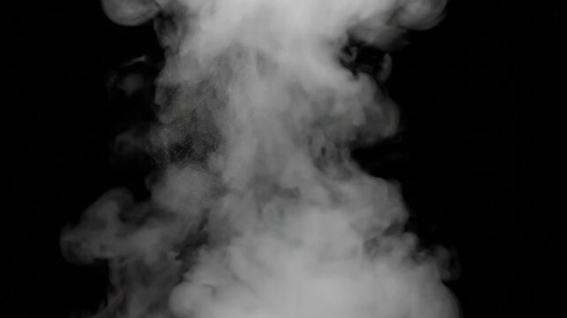 Abstract white cloud puff rising with wisps and particles against black background showing smoke plume