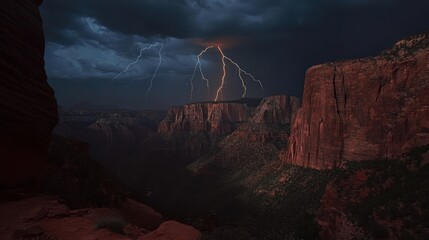 Dramatic lightning storm over rugged canyon landscape