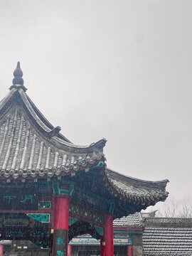 Traditional Chinese pavilion under heavy snow at Daming Lake, Jinan city. Winter landscape with copy space