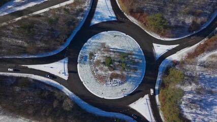 Aerial drone view of Ebbw Vale, Wales, covered in snow on a sunny winter day