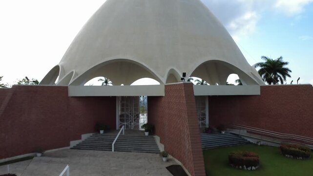 BAHAI TEMPLE in Panama City. Iconic concrete dome structure overlooks a sprawling cityscape and distant ocean horizon. 1 of 9 Bahai Temples in the world. 
