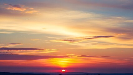 Fototapeta premium Vibrant Sunset with Clouds and Sky.