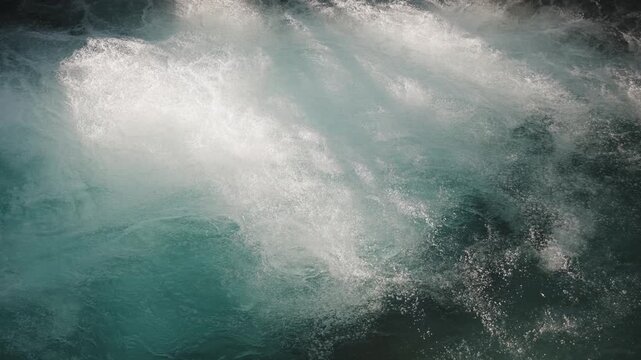 Slow Motion Close Up of White Foaming Water Bubbles in Turquoise River, Abstract Water Texture, Fresh Clean Water Background, aerate stream current