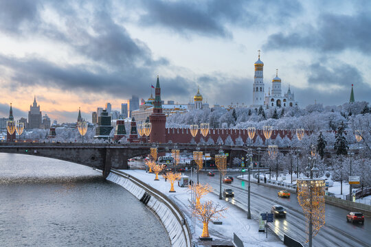 Moscow Kremlin and the ensemble of the Kremlin Cathedral Square against the backdrop of the Bolshoy Moskvoretsky Bridge over the Moskva River, Moscow, Russia