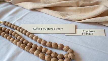 Serene Natural Elements Featuring Wooden Beads and Soft Fabric for Mindfulness and Relaxation Practices in Tranquil Setting