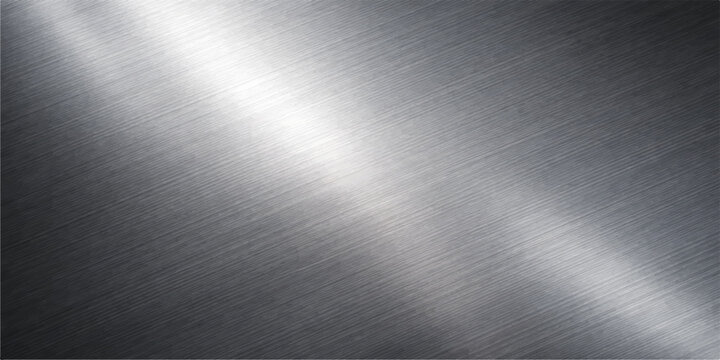 Polished silver stainless steel plate with a brushed metal texture and shiny aluminum surface featuring light grey reflections on an industrial metallic sheet material