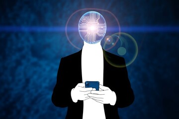 Faceless businessman using smartphone with digital technology concept and futuristic glowing head