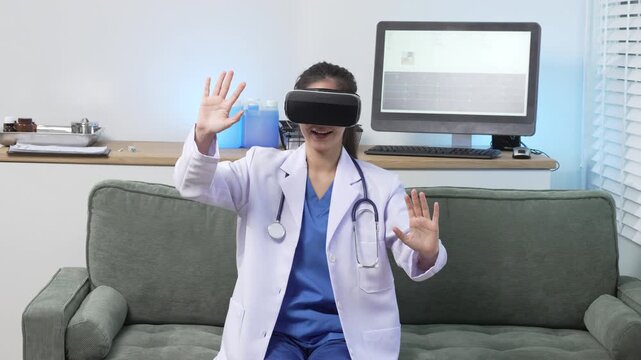 An Asian female doctor uses virtual reality controllers at a clinic desk, exploring immersive medical simulation, digital healthcare training, advanced technology applications, education, diagnosis