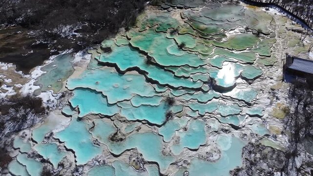 Panorama of multi-colored pond of Huanglong Scenic and Historic Interest Area