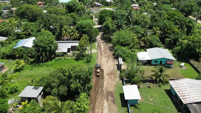 Road Grading and Paving Works in Rural Tela, Honduras, Community Development, Infrastructure Upgrade, Social Impact