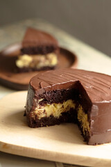 freshly sweet baked western popular dark chocolate mocha coffee durian fruit cake pastry cookies dessert in wood board & cloth yummy cafe halal chef food hotel menu luxury 