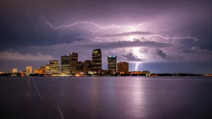 Lightning Over Coastal City Skyline At Night