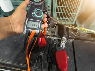 Check the battery voltage using a tester to determine the health condition of the battery.