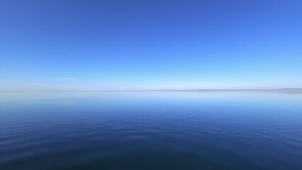 Fototapeta premium mistreat. A perfectly flat lake mirroring the sky with a seamless horizon. travel magazines, destination branding, designed for outdoor magazines and nature guides and travel destination branding.