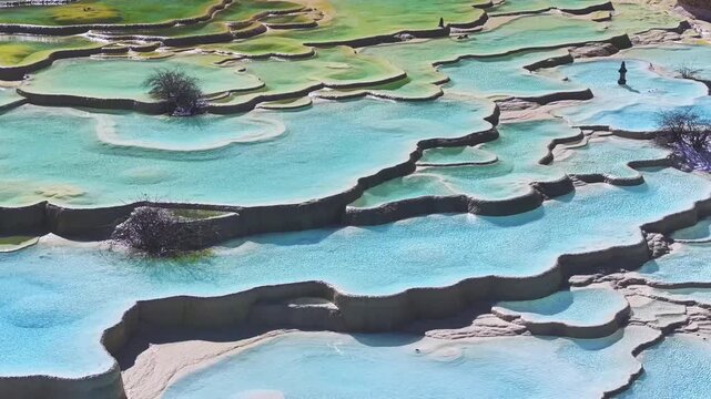 Close up of multi-colored pond at Huanglong Scenic and Historic Interest Area