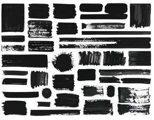 Assortment of diverse black ink brush strokes on white background, creating abstract, textured shapes