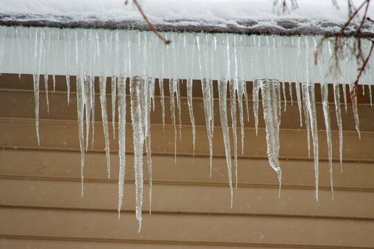 icicles hanging from a roof